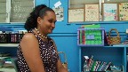 Dionne watches as the kids open their laptops